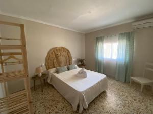 Postel nebo postele na pokoji v ubytování Casa Valdevientos Alojamiento Rural + 37 fotografií