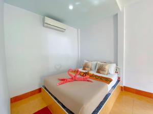Кровать или кровати в номере Hassana Garden Home