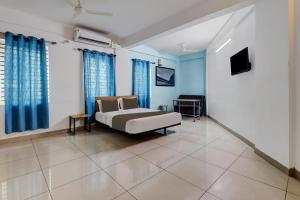 Gallery image of Collection O S M SUITES in Bangalore