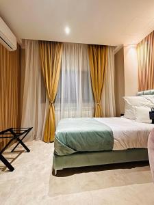 Postel nebo postele na pokoji v ubytování Hotel Clipa