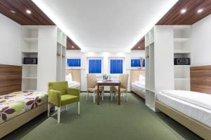 Postel nebo postele na pokoji v ubytování Hotel Alea City + 24 fotografií