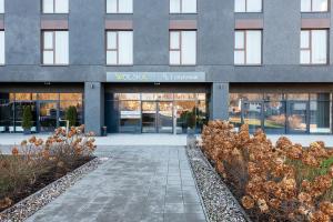 Budova, v ktorej sa apartmánový hotel nachádza + 37 fotografií