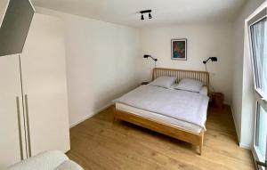 Postel nebo postele na pokoji v ubytování Gebirgsresort Winterberg