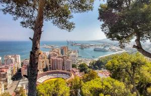 a view of a city with boats in the water at Awesome Apartment In Málaga With Wifi in Málaga