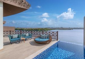 a view of the water from the deck of a villa at Anantara Mina Ras Al Khaimah Resort in Ras al Khaimah +74 photos