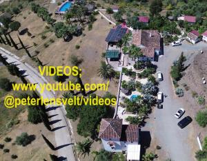 arial view of a house in a subdivision at Tiny house 12m2 in holiday park with 55 m2 pool in Tolox