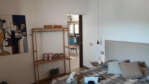 Una cama o camas en una habitación de Villa Oasi dune e mare