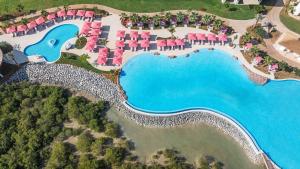 an aerial view of a resort with a pool at Anantara Mina Al Arab Ras Al Khaimah Resort in Ras al Khaimah
