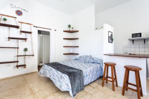 Postel nebo postele na pokoji v ubytování El Hostal del Cubo