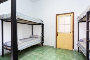 Postel nebo postele na pokoji v ubytování El Hostal del Cubo