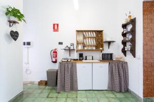 Kuchyň nebo kuchyňský kout v ubytování El Hostal del Cubo