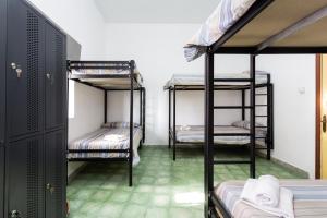Postel nebo postele na pokoji v ubytování El Hostal del Cubo