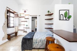 Postel nebo postele na pokoji v ubytování El Hostal del Cubo
