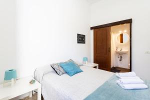 Postel nebo postele na pokoji v ubytování El Hostal del Cubo