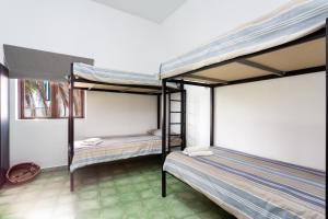 Postel nebo postele na pokoji v ubytování El Hostal del Cubo