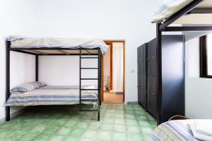 Postel nebo postele na pokoji v ubytování El Hostal del Cubo