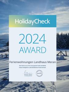 a poster for a holiday check in the snow at Ferienwohnungen Landhaus Meran in Willingen