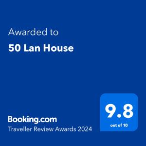 un teléfono azul con las palabras otorgadas a una casa Ian en 50 Lan House, en Yilan City