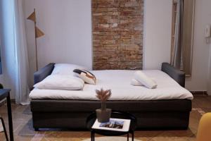 Cama o camas de una habitación en Charmant studio à deux pas de Monaco