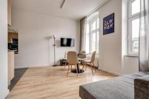 TV a/nebo společenská místnost v ubytování Apartamenty Mickiewicza - Superior Suites Katowice
