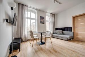 TV a/nebo společenská místnost v ubytování Apartamenty Mickiewicza - Superior Suites Katowice