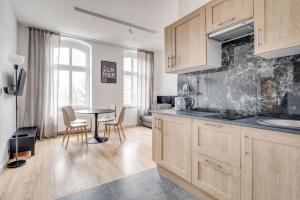 Kuchyň nebo kuchyňský kout v ubytování Apartamenty Mickiewicza - Superior Suites Katowice