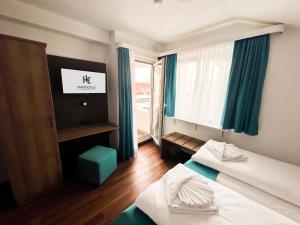 Postelja oz. postelje v sobi nastanitve Hotel Hansa Stuttgart City