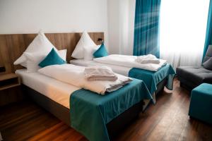 Postelja oz. postelje v sobi nastanitve Hotel Hansa Stuttgart City