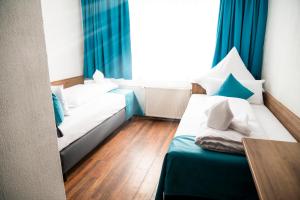 Postelja oz. postelje v sobi nastanitve Hotel Hansa Stuttgart City