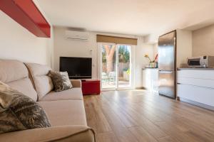 TV a/nebo společenská místnost v ubytování Loft in Cabrils