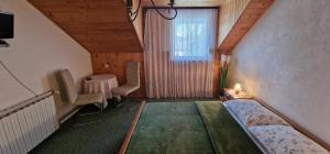 Televízia a/alebo spoločenská miestnosť v ubytovaní House Samardzic