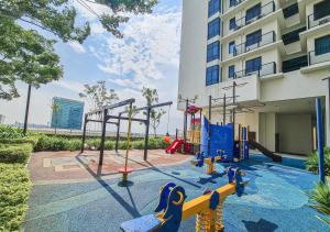 a playground in front of a building at Miko's Studio @ Setia Convention in Shah Alam