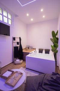 Postel nebo postele na pokoji v ubytování Effedi Loft