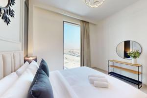 Postel nebo postele na pokoji v ubytování Summer at Creek Beach - Calm One Bedroom + 20 fotografií