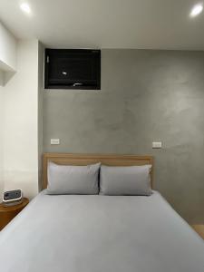 Postel nebo postele na pokoji v ubytování 無生居 Wu Sheng Stay + 24 fotografií