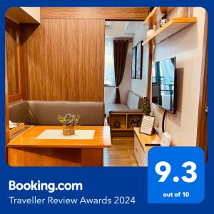 a review of a travel review awards for a hotel room at Condominium at Spring Residences near Airport in Manila