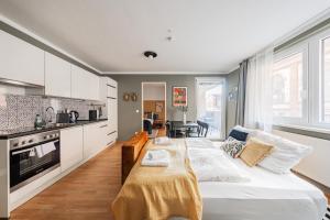 O bucătărie sau chicinetă la Modern Living Apartments Vienna, 15 min to center