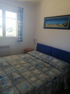Säng eller sängar i ett rum på Casale di Mare Palombaggia