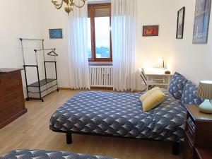 Ένα ή περισσότερα κρεβάτια σε δωμάτιο στο Alloggio luminoso sul Parco, Comodo per il centro, Free Parking, 2 camere, 4 posti letto,
