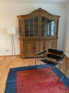 a chair sitting on a rug in a room at Ferienhaus am Teutoburger Wald in Detmold