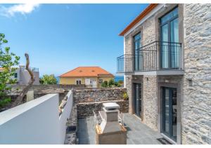 a view from the balcony of a house at Casa Lanço with Spectacular View in Funchal