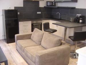 Kuchyň nebo kuchyňský kout v ubytování Appartement touristique, proche de la cathédrale