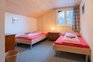 Postel nebo postele na pokoji v ubytování Lehmann's Herberge Hostel