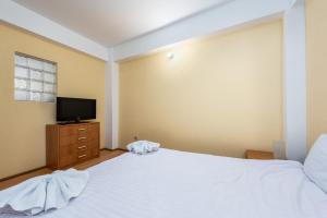 Postel nebo postele na pokoji v ubytování Central Apartament Predeal Nr 2