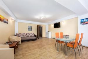 TV a/nebo společenská místnost v ubytování Central Apartament Predeal Nr 2
