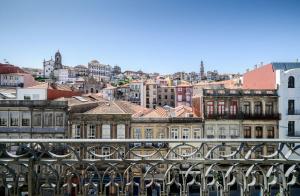 a view of a city from a bridge with buildings at Mouzinho 160 in Porto