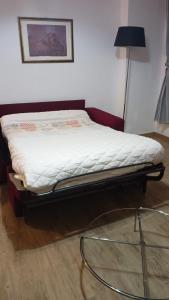 Cama o camas de una habitación en La Tana del Capriolo