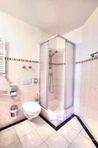 Ванная комната в Hotel Himalaya Frankfurt City Messe