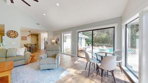 a living room with a table and chairs at 79 Port Tack in Hilton Head Island