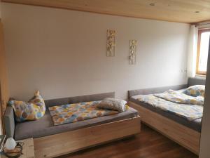 A bed or beds in a room at Bereuter